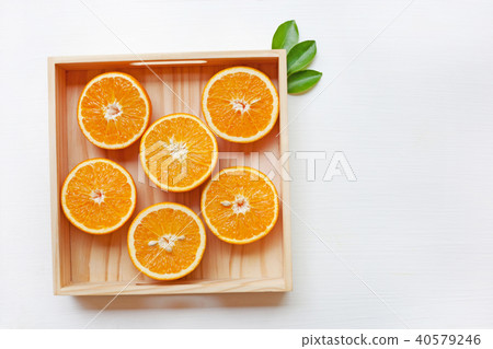 Fresh orange citrus fruit in wooden box. Fresh orange citrus fruit in wooden box. 40579246