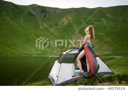 Attractive naked woman in camping - Stock Photo [40579529] - PIXTA