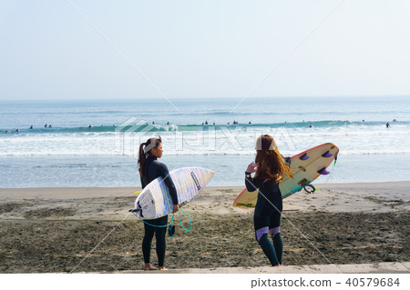 Surfing woman sea coast kamogawa city 40579684