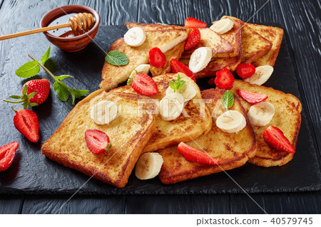 French toasts with fruits, top view French toasts with fruits, top view 40579745