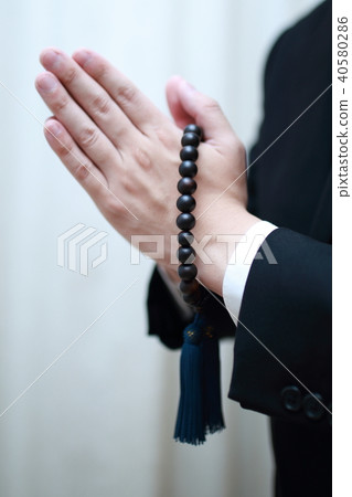 Funeral (Black formal ward farewell suit suitcopy space body part no face beads) 40580286