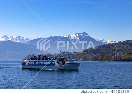 Blue sky and Alps seen from Lake Lucerne in Switzerland Blue sky and Alps seen from Lake Lucerne in Switzerland 40581289