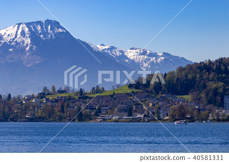 Blue sky and Alps seen from Lake Lucerne in Switzerland Blue sky and Alps seen from Lake Lucerne in Switzerland 40581331