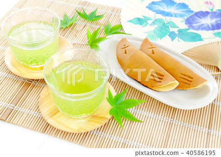 Summer Japanese sweets, sweetfish sweets and cold tea Summer Japanese sweets, sweetfish sweets and cold tea 40586195