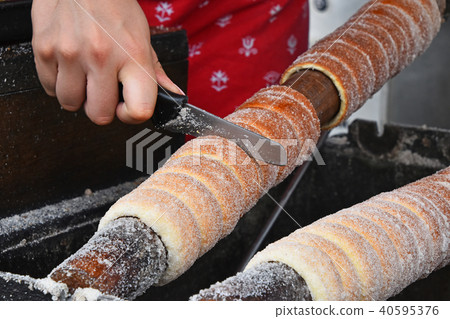 Close up baking chimney cake on grill 40595376