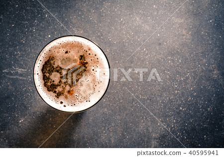 Beer glass on dark table. Top view 40595941