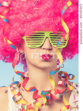 Portrait of beautiful woman in pink wig Portrait of beautiful woman in pink wig 40595955