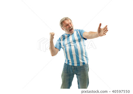 The Argentinean soccer fan celebrating on white background The Argentinean soccer fan celebrating on white background 40597550