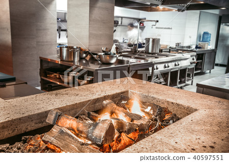 Close-up burning firewood . Kitchen background. Close-up burning firewood . Kitchen background. 40597551