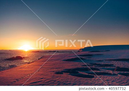 The polar sunrise sunset in the Antarctica. 40597732