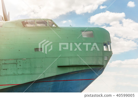 Front part of old amhibian plane against blue sky. Vintage anti-submarine military hydroplane 40599005