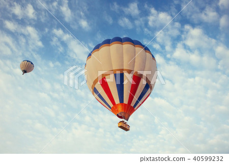 colorful balloon on the blue sky. colorful balloon on the blue sky. 40599232
