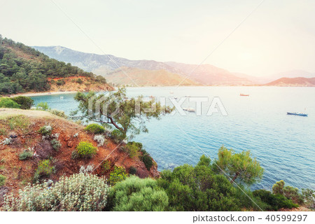 The picturesque sunset. View of the boats at sea. Turkey The picturesque sunset. View of the boats at sea. Turkey 40599297