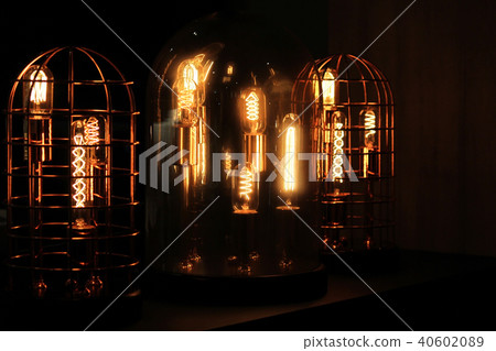antique tungsten light bulbs in steel cage 40602089