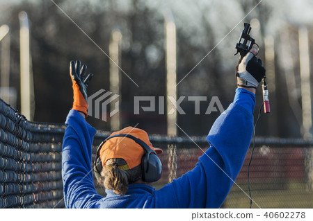 Race official with starters pistol Race official with starters pistol 40602278