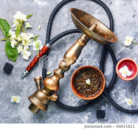 Oriental tobacco hookah with floral jasmine aroma Oriental tobacco hookah with floral jasmine aroma 40615821