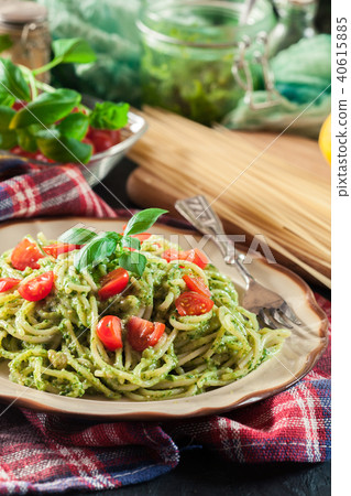 Vegetarian pasta spaghetti with basil pesto 40615885