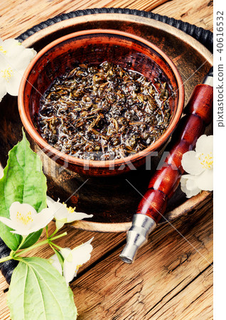 Oriental tobacco hookah with floral jasmine aroma 40616532
