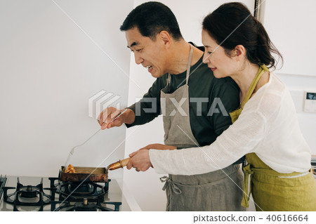Japanese middle men who make fried eggs 40616664