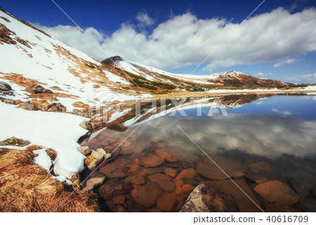 Lake between mountains. Spring landscape. Carpathians. Ukraine Lake between mountains. Spring landscape. Carpathians. Ukraine 40616709