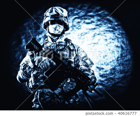 Marine raider posing with automatic firearm Marine raider posing with automatic firearm 40616777