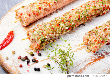 Raw kebabs in skewers 40617046