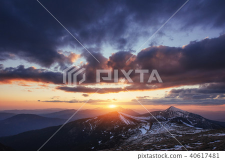 Colorful spring sunset over the mountain ranges in the national  40617481
