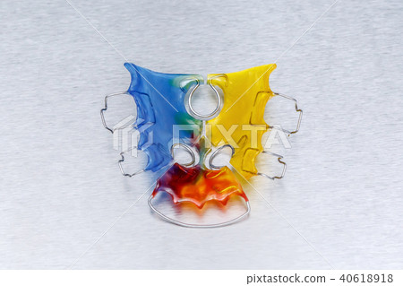 Colorful dental braces or retainer for teeth Colorful dental braces or retainer for teeth 40618918