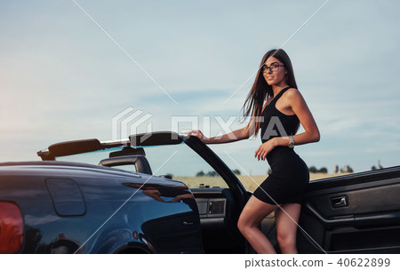 young woman in a photo shoot. young woman in a photo shoot. 40622899