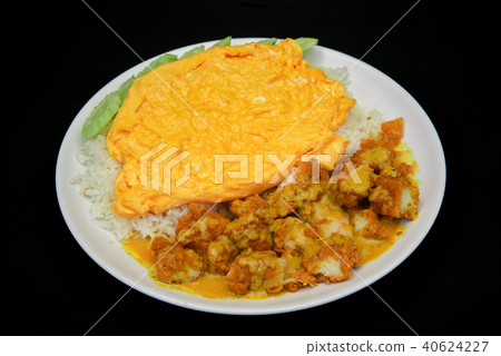 yellow curry fired chicken with black background yellow curry fired chicken with black background 40624227