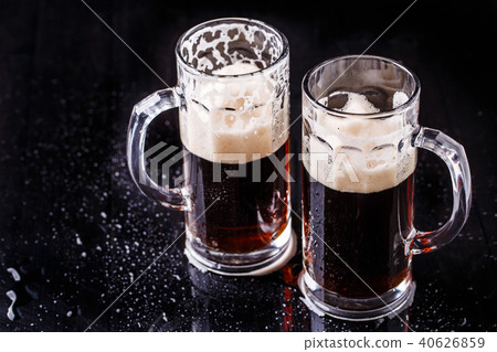 Beer on empty black background Beer on empty black background 40626859