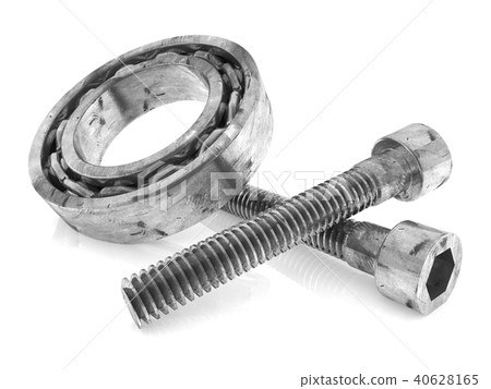 Metal screws and pillow block on white Metal screws and pillow block on white 40628165