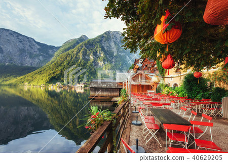 Summer cafe on the beautiful lake between mountains. Alps. Halls 40629205