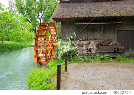 Fresh green Azumino floodplain river and water mill Fresh green Azumino floodplain river and water mill 40632764