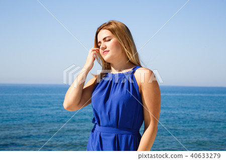 Woman in blue dress 40633279