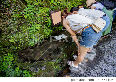 Women who make a fortune fortune at Kifune Shrine in Kyoto 40637106