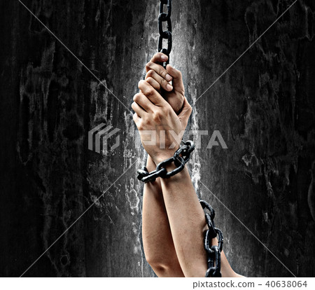 Hands chained isolated mix with dark background Hands chained isolated mix with dark background 40638064