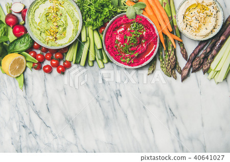 Healthy vegan snack plate with hummus and vegetables, copy space 40641027