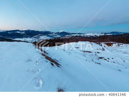 Evening twilight winter mountain ridge panorama 40641346