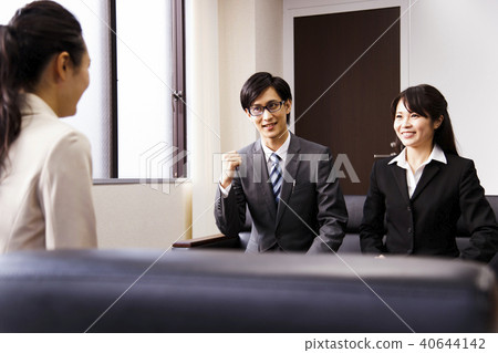 Female business meeting meeting negotiation transaction office young woman businessman male Female business meeting meeting negotiation transaction office young woman businessman male 40644142