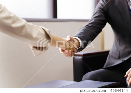 Female business meeting meeting negotiation transaction office young woman businessman male Female business meeting meeting negotiation transaction office young woman businessman male 40644144
