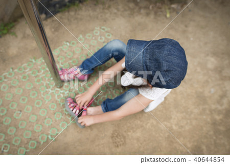Girl wearing sandals Girl wearing sandals 40644854