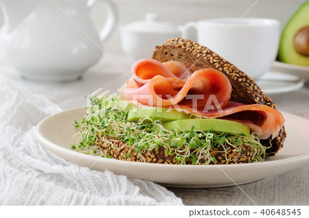 Sandwich with ham and avocado Sandwich with ham and avocado 40648545