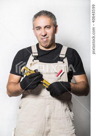 worker specialist plumber, engineer or constructor 40648599