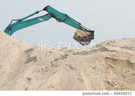 excavator is digging sand excavator is digging sand 40649851