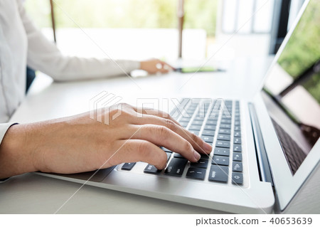 Business woman working and using laptop computer, digital tablet 40653639