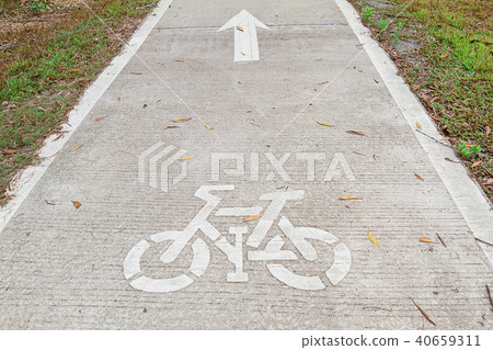 bicycle sign painted on the bike lane in the park bicycle sign painted on the bike lane in the park 40659311