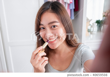 Asian female blogger recording selfie vlog video Asian female blogger recording selfie vlog video 40659508