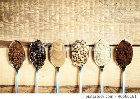 spoons with different types of coffee on a wooden table spoons with different types of coffee on a wooden table 40660161