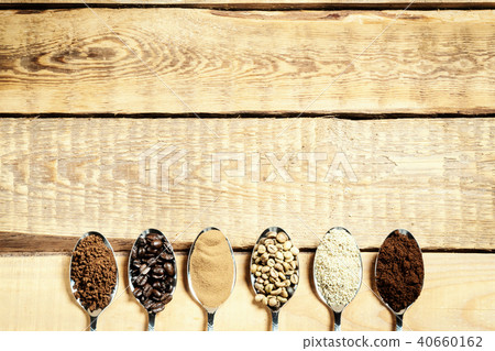 spoons with different types of coffee on a wooden table spoons with different types of coffee on a wooden table 40660162